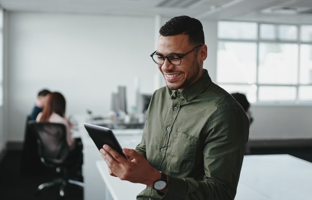 Stock image of a man looking at a report