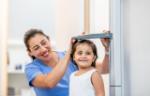 Image of child being measured. Credit: iStock.com