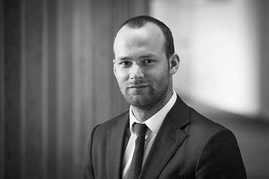 Nicolas Hamblenne head and shoulders shot in black and white