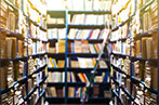 Shelves filled with books in a library.