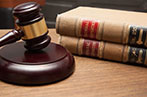 Gavel and legal books on a desk