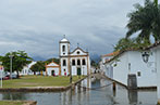 Flooded street in Brazil with a church