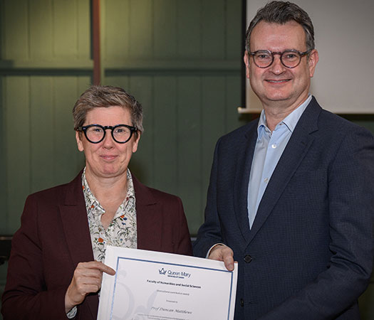 Professor Duncan Matthews receiving his award from Professor Frances Bowen