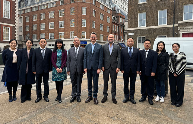 Professor Duncan Matthews, Professor Noam Shemtov and Dr Guan Tang standing with the delegation from the Guangdong Intellectual Property Protection Centre outside the Centre for Commercial Law Studies.