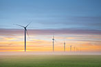 Wind turbines at dawn in the Netherlands.