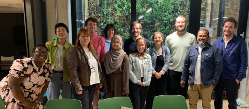 group of people at a workshop on evaluation techniques