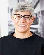 Professor Kathryn Yusoff. She is wearing a black top, glasses and has silver hair.