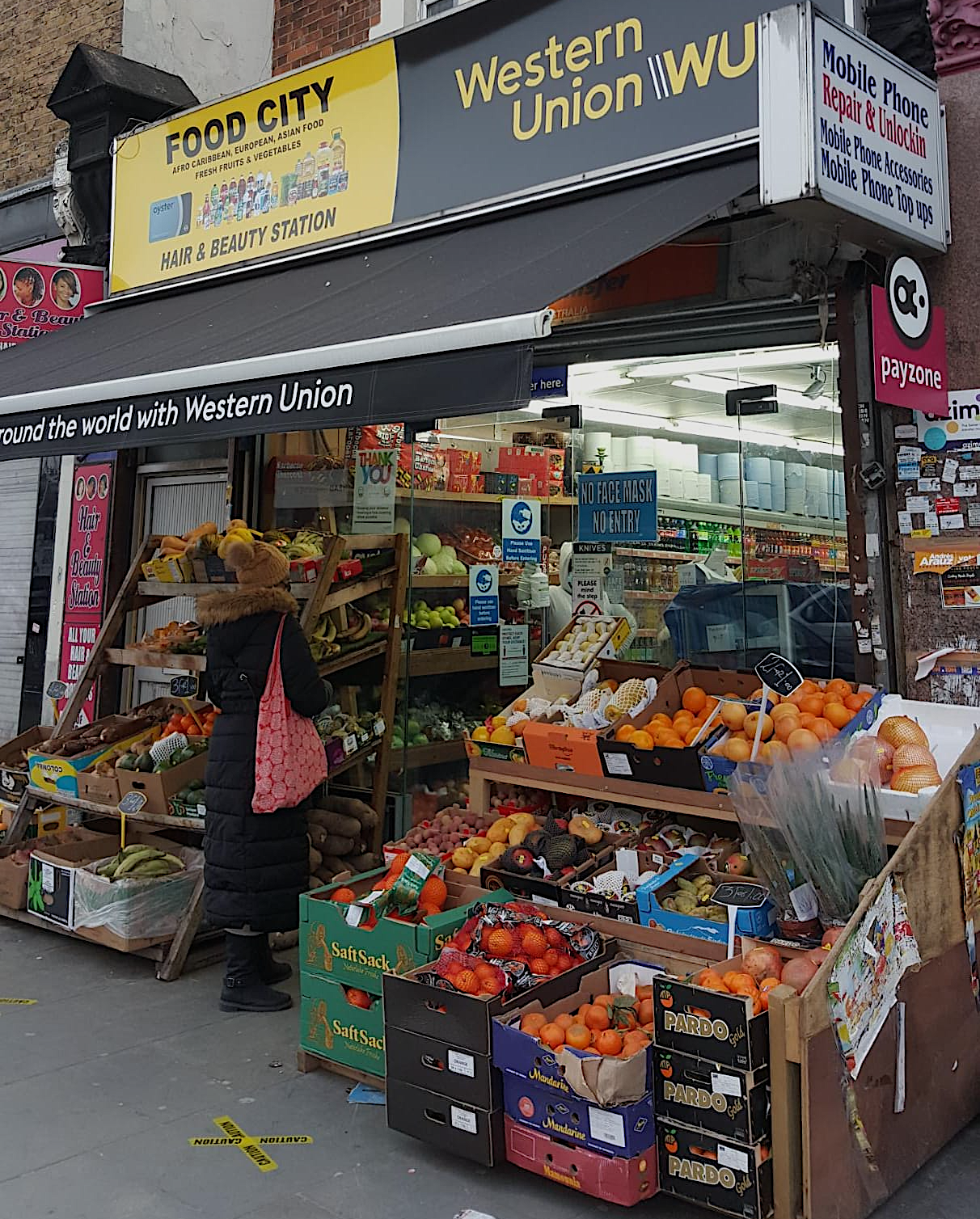 Front of a shop where migrants can remit to family and friends