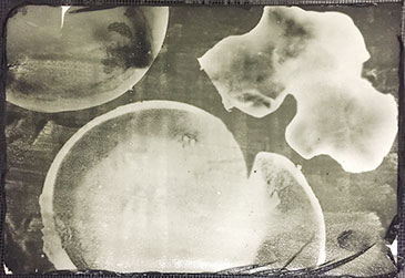 Photogram of cast and set gelatine objects onto leather coated with handmade silver gelatine emulsion.