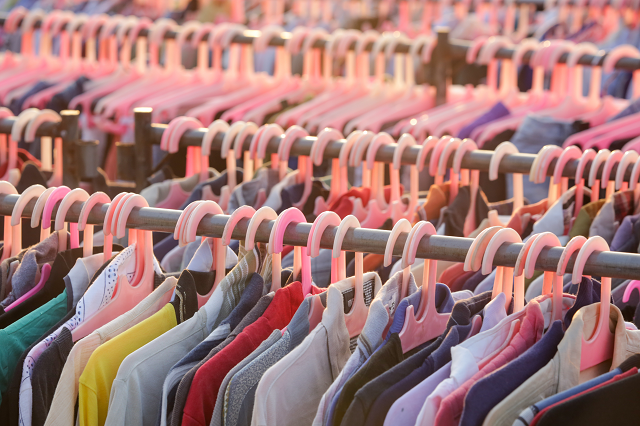 Racks of clothes on hangers