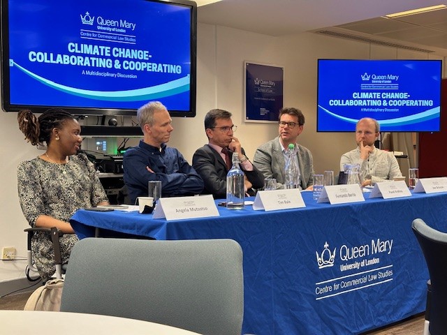 panel members sitting at a panel