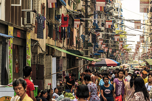 A busy market street in Yangon in Burma