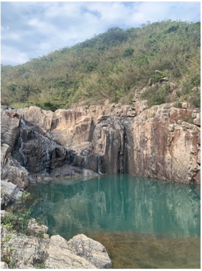 Photo of mountain and a turquoise lake