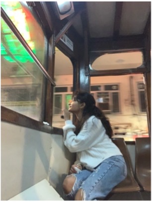 Tejal Shah sitting by a window