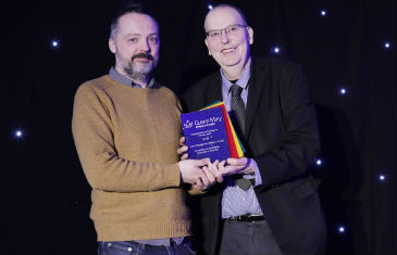 A photo displaying two people at the Engagement Enterprise Awards event