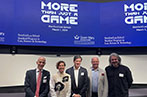 Ioannis Kokkoris, Michaela MacDonald and Gaetano Dimita standing with academics from Stanford University.