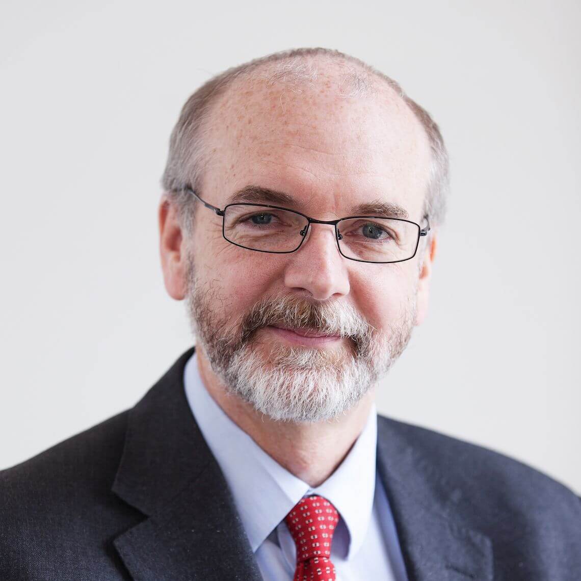 Headshot of alumnus Professor Andrew Pollard