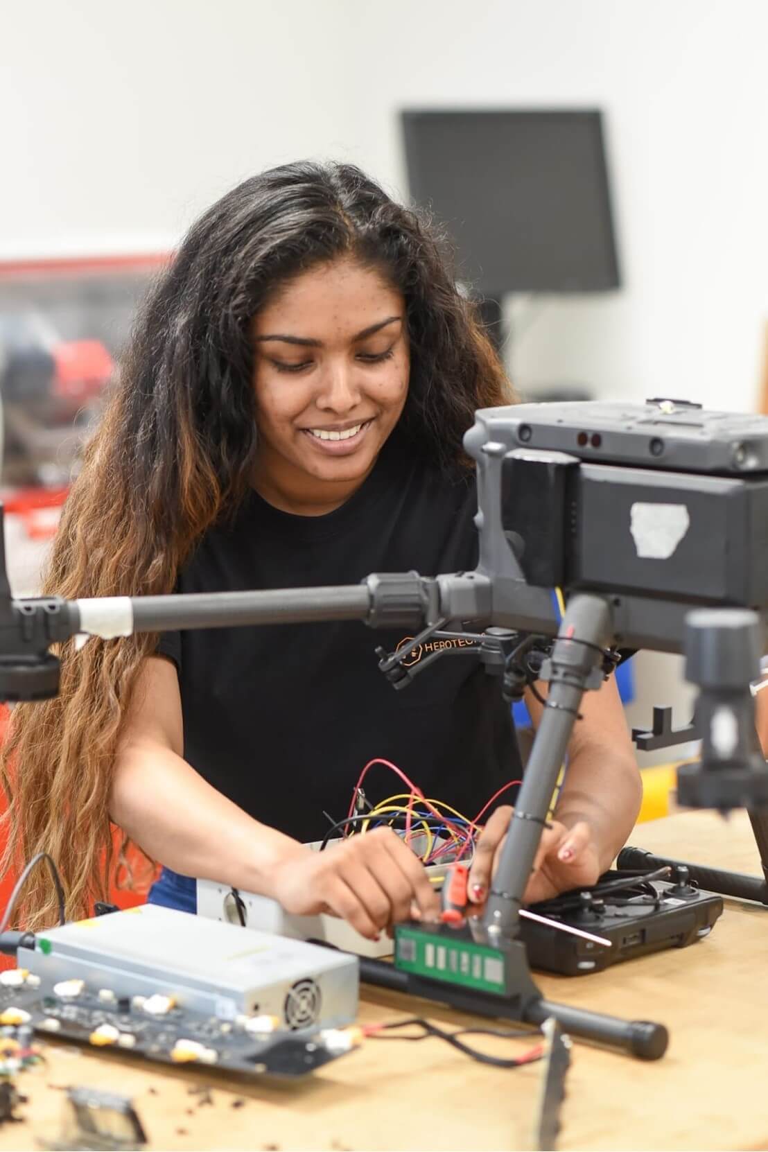 Alumna Dilani Selvanathan hosting a robotics demonstration.