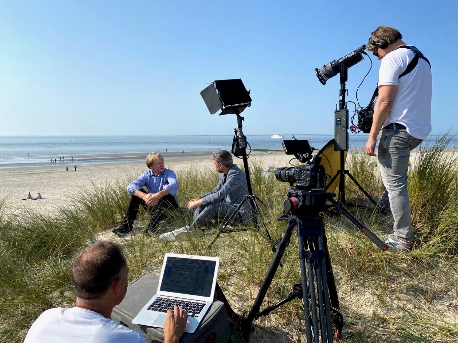 Photo of alumnus, Dr John Goodyear, filming documentary, Happy Birthday Niedersachsen