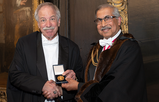 Professor Jack Cuzick receiving Galen Medal from Air Vice Marshal Aroop K Mozumder