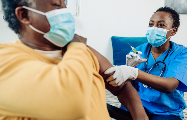 Man being vaccinated.