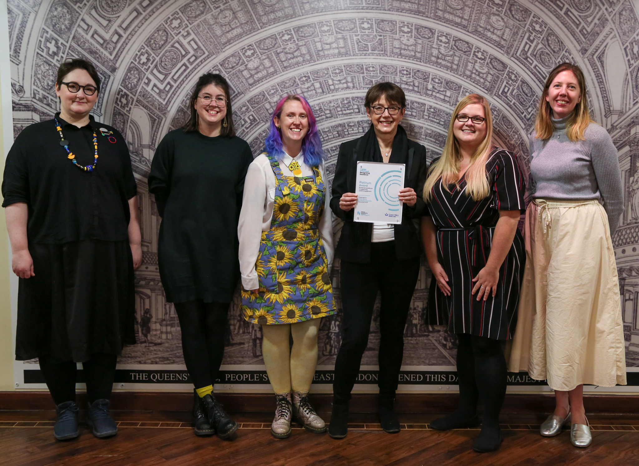 5 members of the centre for public engagement and vice principal Philippa Lloyd standing with the Watermark plaque