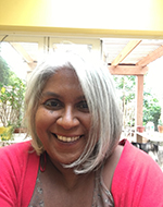 Professor Uma Suthersanen in a magenta top