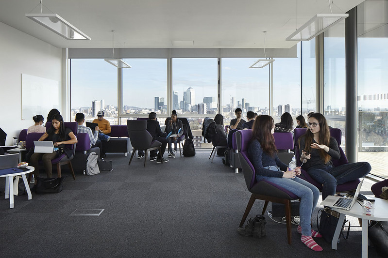 Students in small groups in conversation