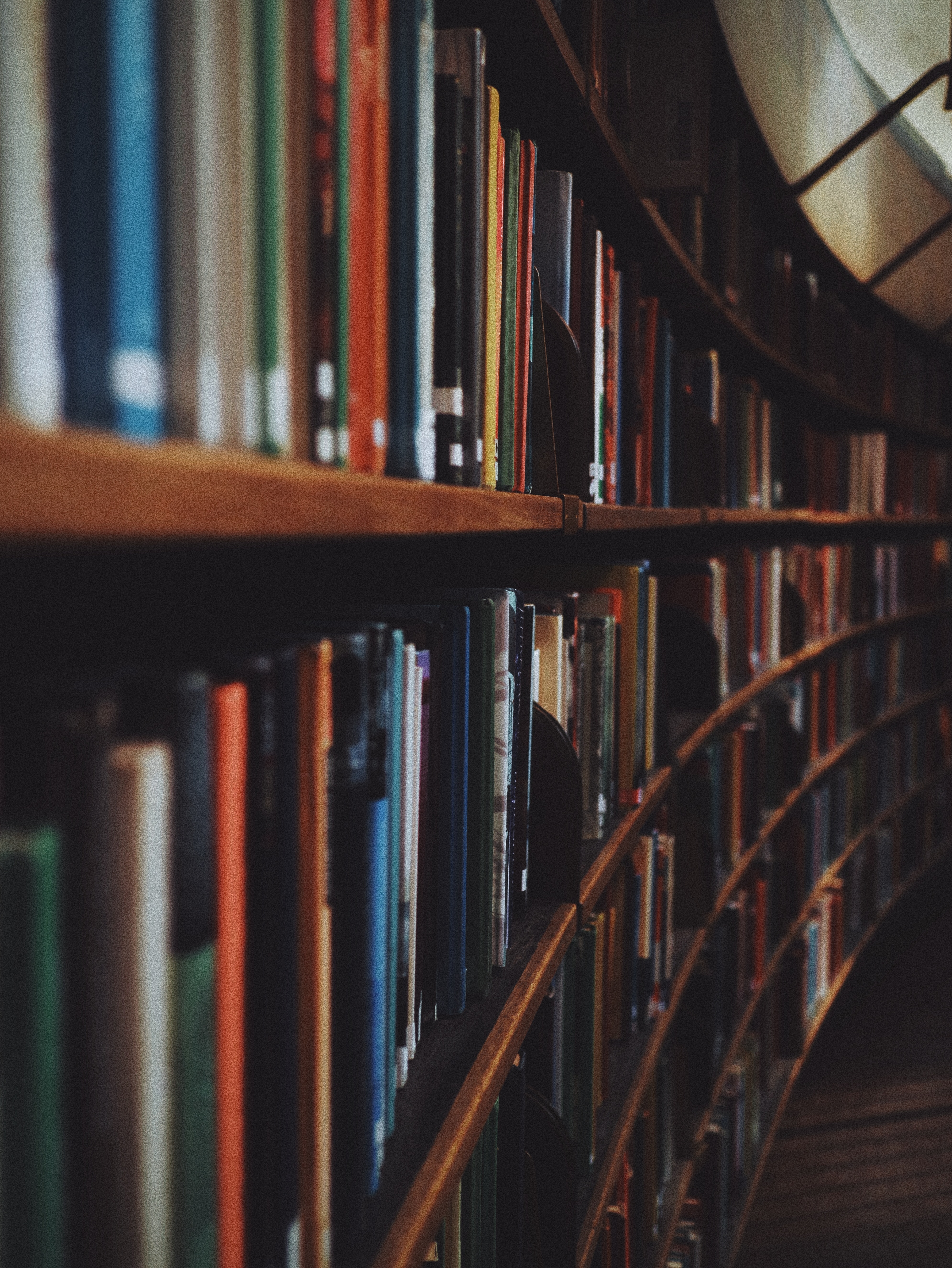 Two rows of books in a library