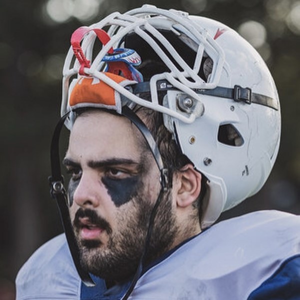 Photo of alumnus, Hussain Khan, playing American Football with the QMBL Vipers