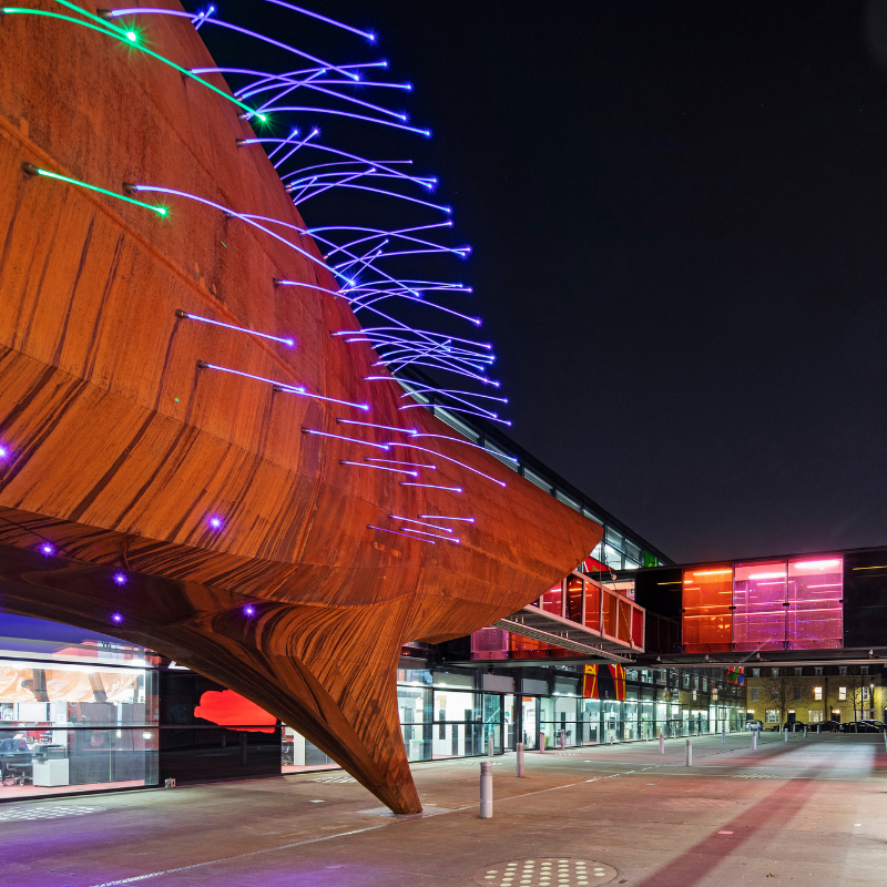 Neuron Pod at the Blizard Institute illuminated at night