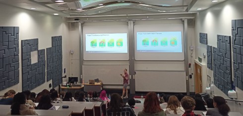 Students experiencing a physics lecture on neutrinos by Dr Linda Cremonesi