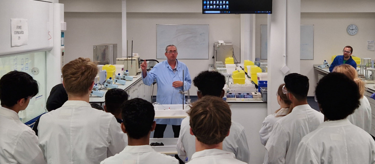 Students in the chemistry laboratory during the 2022 residential summer school