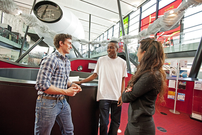 Students talking inside the Blizard institute