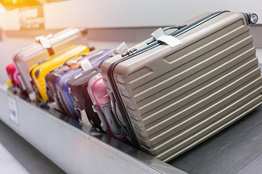 Suitcases on conveyor belt