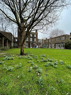 Students in the courtyard at a writing retreat