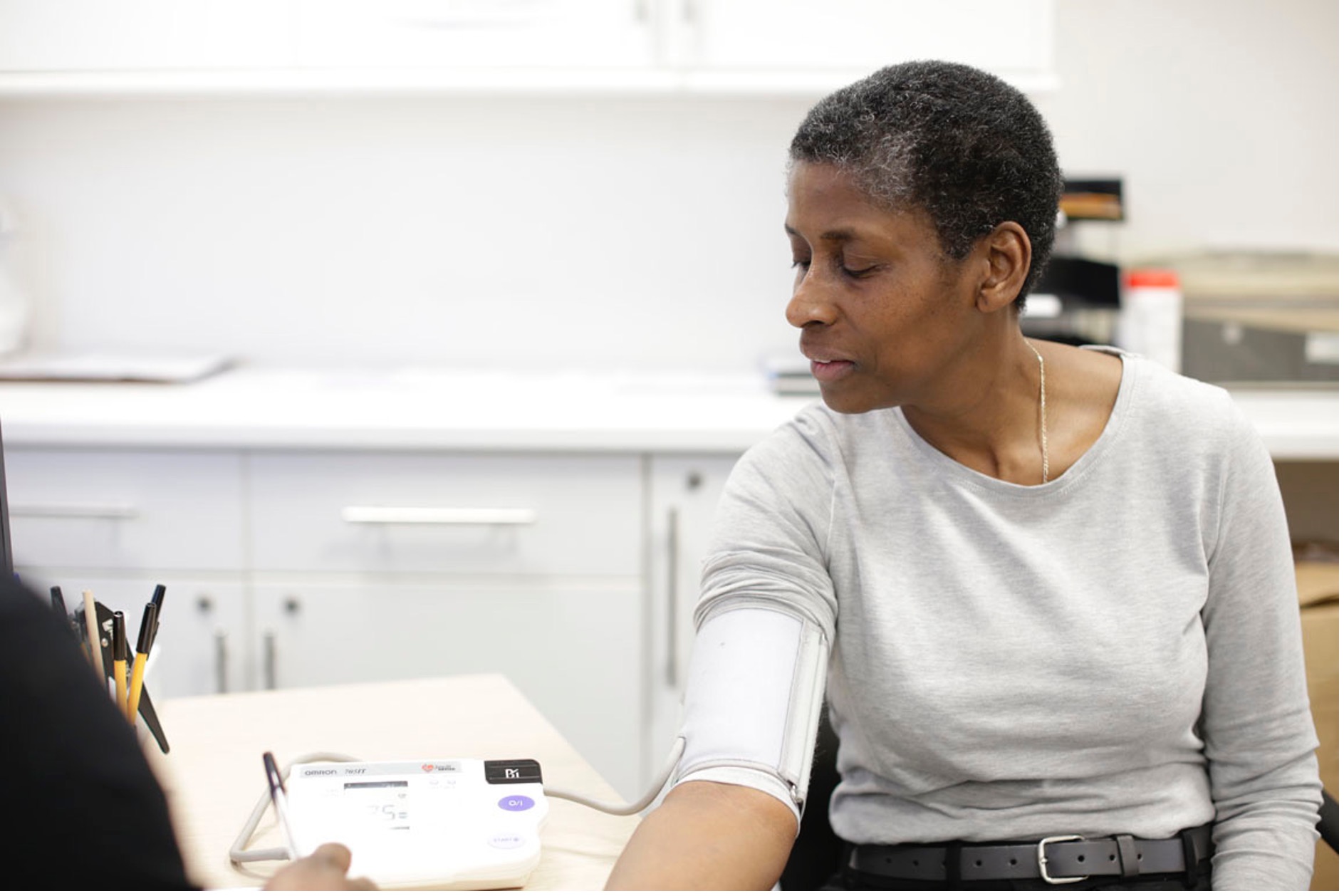 A patient having a blood pressure check